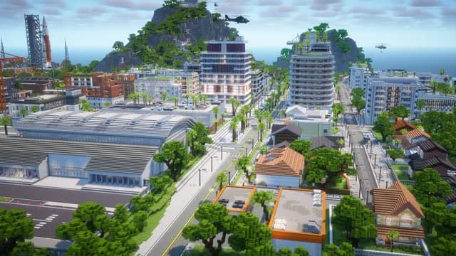 Montello City vue du ciel : le commissariat, le grand boulevard et les tours du centre, des hélicoptères en vol au-dessus de la baie