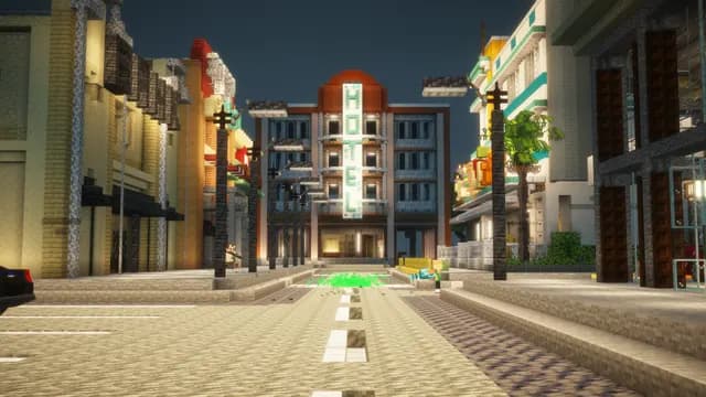Une rue commerçante au crépuscule et l’enseigne verticale au néon d’un hôtel